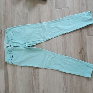 Green skinny jeans size 28